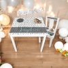 geboortestoeltje met tafel